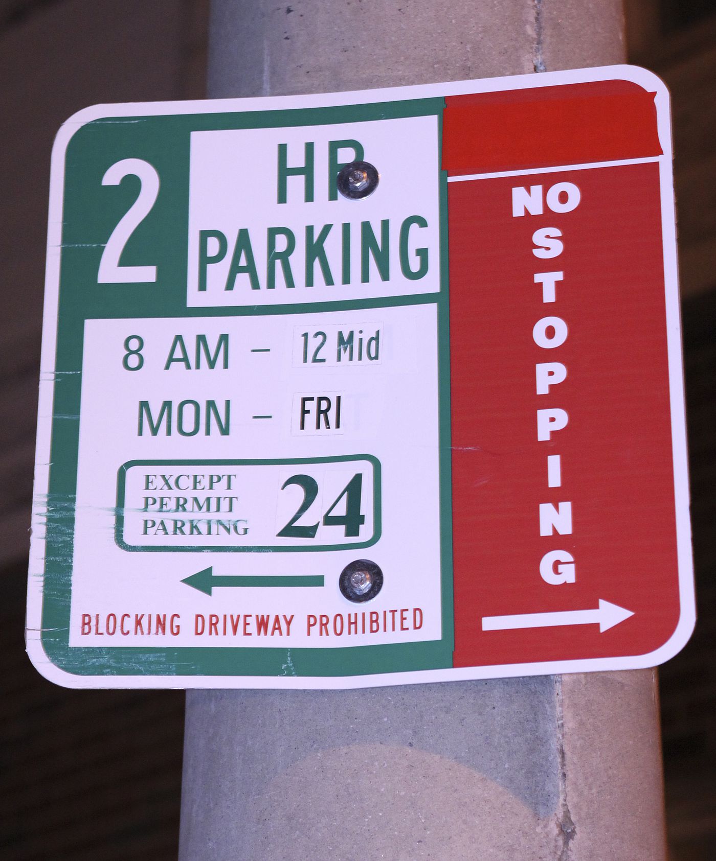 Parking sign on 12th Street near Moore Street.