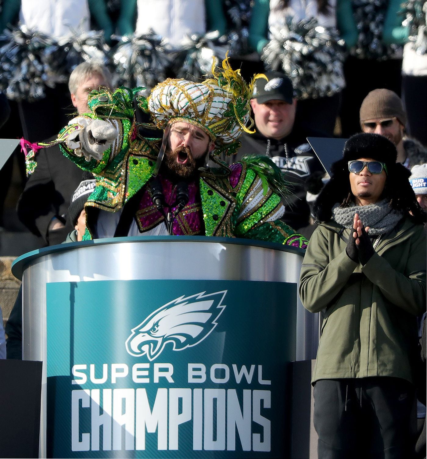 Dressed in Mummers attire, Eagles center Jason Kelce pauses during his colorful speech on the Art Museum steps during the Eagles Super Bowl parade.