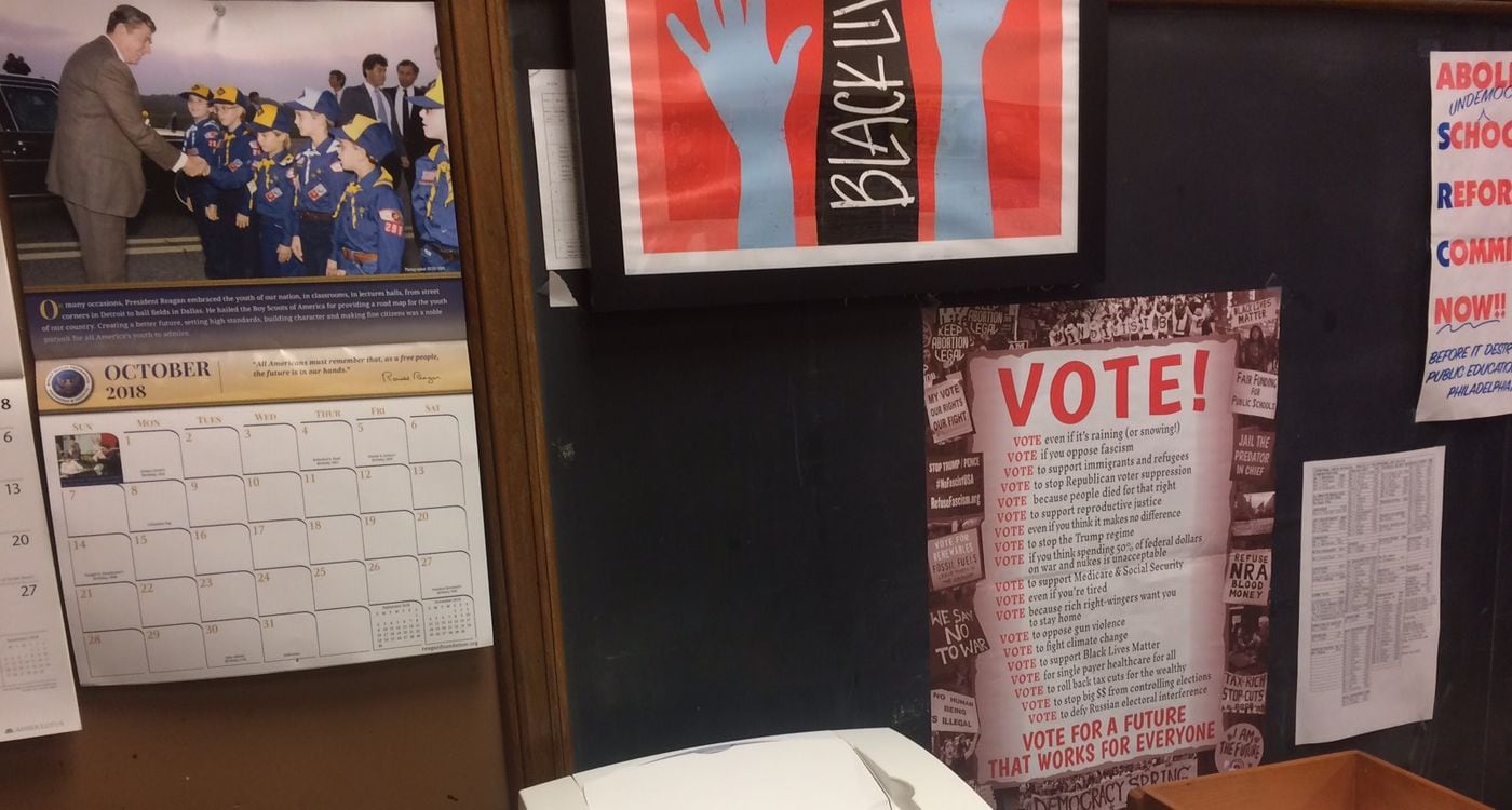 In this staff room at Central High School, teachers have posted political posters and signs from both sides of the aisle.